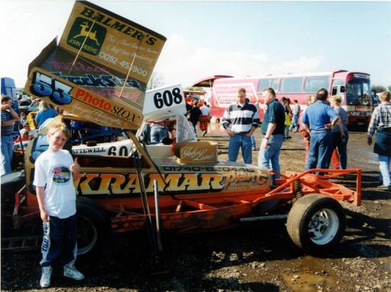 A moment with his hero's car!  The World-winning all-gold car of 53 John Lund at the May NIR meeting, 1997
