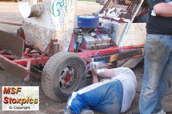 31 Richard Thornton fits a new side rail before the final, where he finished 10th
