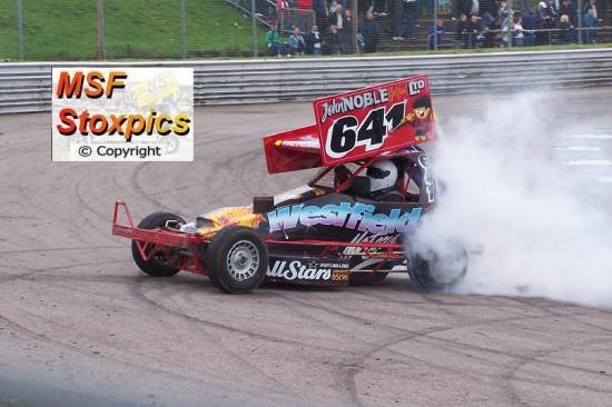 641 Dennis Middler does donuts after team scotland win the speedway
