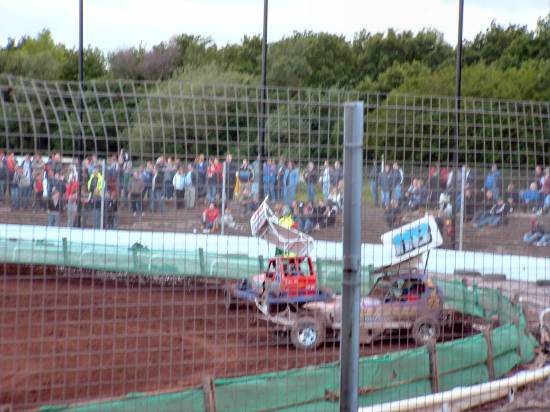 Andrew Bowler and Steve Harrison in turn 3 fence
