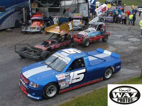 #1 , #446 , #212 , #515 all in shot with Simon Carr's #15 Truck
A nice shot which includes a good few cars & the #15 truck of Ex-F1 Simon Carr. 

Was planned to have match race F1 Vs Truck but guessing due to heavy rain safety came first.
