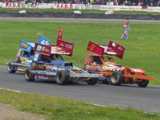 Second to last lap of the final battle for 2nd and third dan Johnson and Paul harrison
