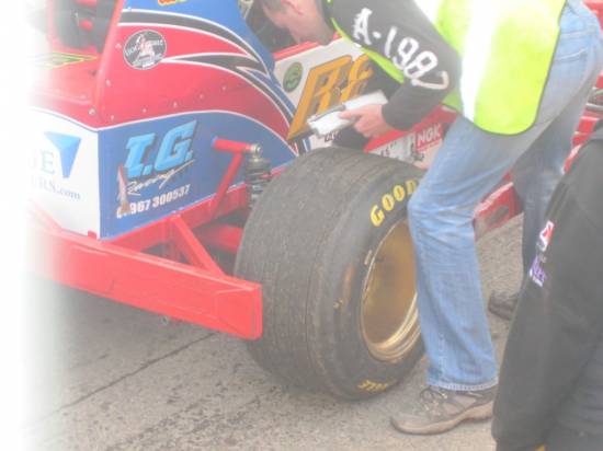 Tyre stamp being applied as the cars go out onto track
