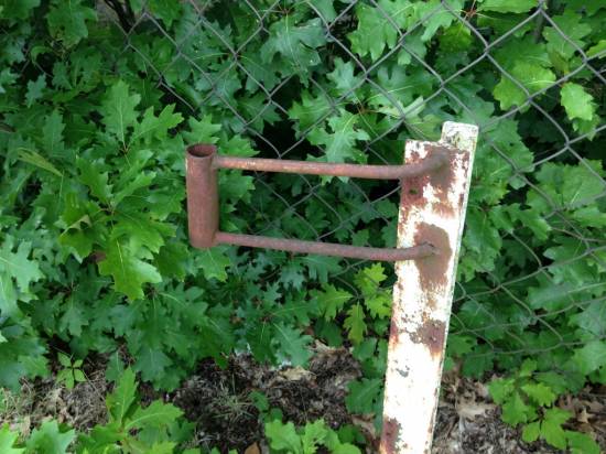 Fence post. Is that a bracket for a flag on this one???....
