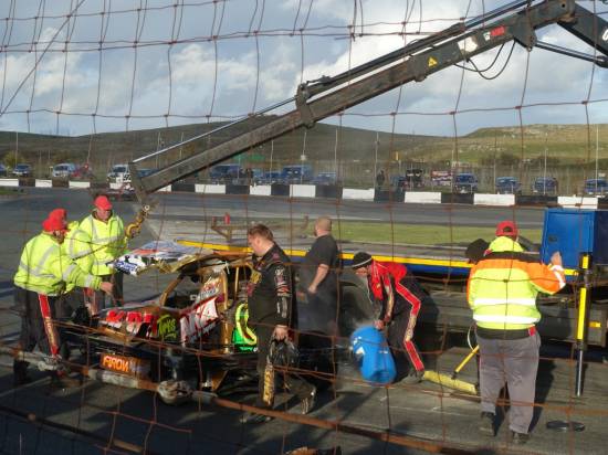V8's - Three wide into turn 1 caused Adam Joyce to ride the fence and end up on his roof   
