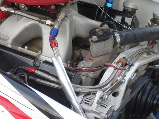 84 - Engine bay wiring damaged after it shorted out against the body during the Final
