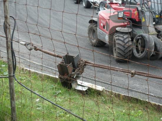 Turn 4 fence post repair after the incident
