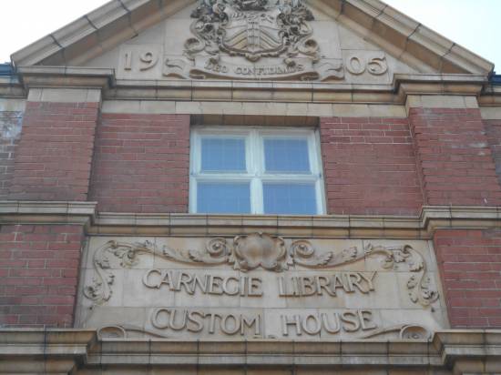 A survivor - Carnegie Library stands opposite to where the track would have been. 
