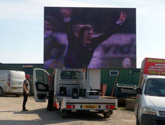 A few pics from Sunday - Rob makes sure all is well with the big screen
