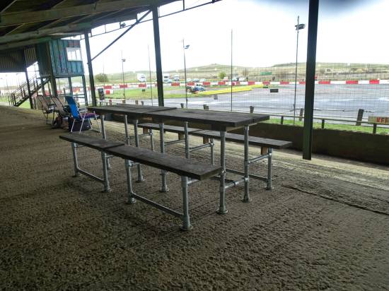 Welcome to Buxton - Picnic tables in the grandstand
