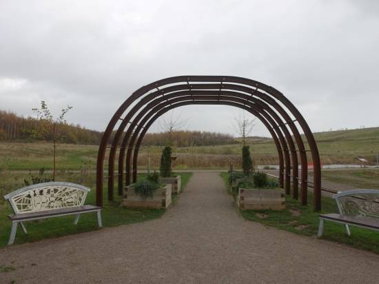 The arched entrance to the Memorial Garden is made from steel rings that were once used to support the underground tunnels
