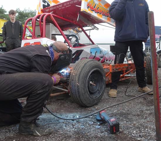 Jon welding the wheel-guard attachment point after it came adrift early on

