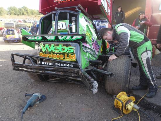 20 - Final damage. Liam having a look at the bent rear axle.
