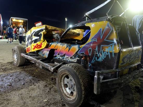 The 532 car looking a bit worse for wear after getting pinned against the turn 4 fence by 526 during Heat 2
