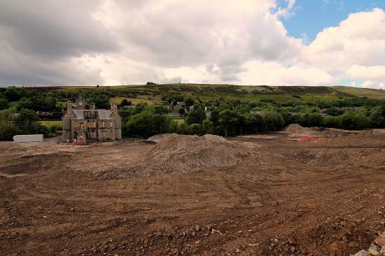 All that remained of the site a week later was the listed office building and clock tower
