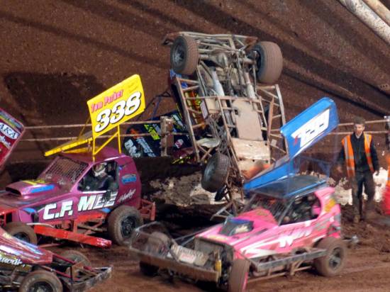 Joe Booth ended up with the back of his car over the turn 3 fence in a spectacular crash during the Final

