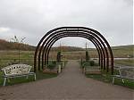 1aa_The_arched_entrance_to_the_Memorial_Garden_is_made_from_steel_rings_that_were_once_used_to_support_the_underground_tunnels.JPG