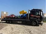 23_A_flatbed_Scania_brought_two_of_the_Team_Harrison_cars.JPG