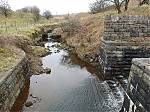 24_Cheesden_Brook_flows_toward_the_camera_from_the_moorland_above_into_the_Lumb_Mill_complex.JPG