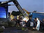 24_Following_damage_from_Heat_2_a_flatbed_mounted_crane_was_used_to_help_out_with_support_for_the_1_car.JPG