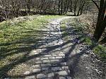 56_The_cobbled_road_leading_into_the_Deeply_Vale_Mill_complex.JPG