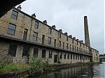 Slater_Terrace_with_a_boilerhouse_chimney_surviving_from_one_of_the_Sandygate_Mills.JPG