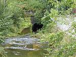 The_River_Calder_joins_the_Leeds___Liverpool_Canal_through_this_tunnel.JPG