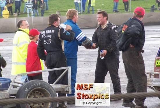 Stu Smith jnr shakes hands with Paul Harrison
