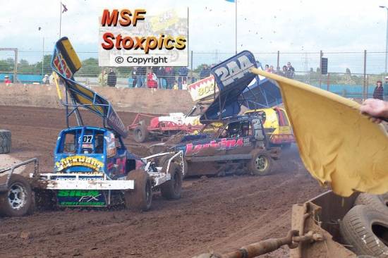 244 Mick Rogers hit the tyres and bounced out into the traffic
