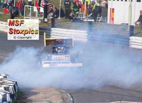 FWJ lets rip as he exits the pits in a cloud of smoke

