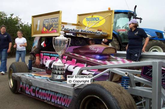 1 Fwj with World Final Trophy on car
