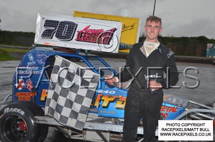 First win for Aaron Leach
