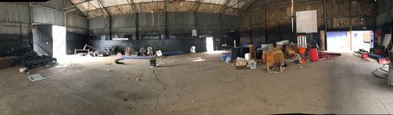 The main hangar - door on the left opened by the gypsies, door on the right leads to speed square.
