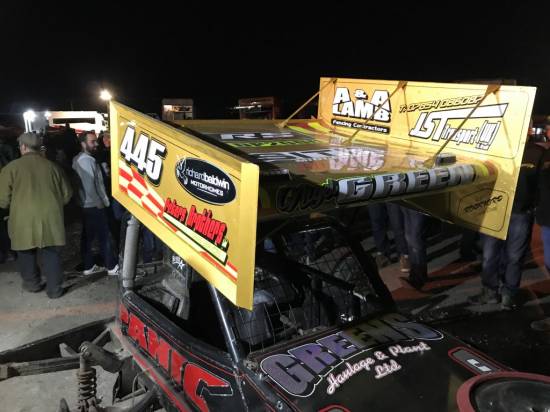 445, sign written gold wing on the tar car
