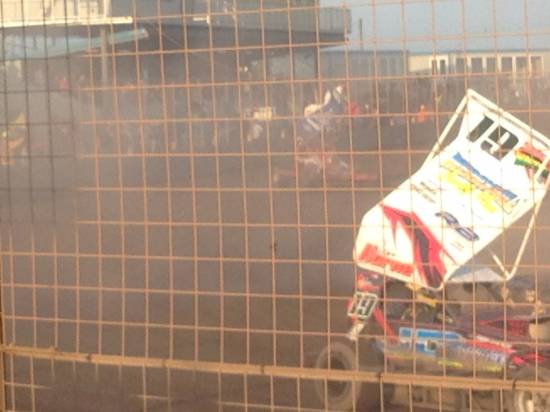 45, has just been collected after being sideways across the home straight. Fuel tank bursting as it was hit.
