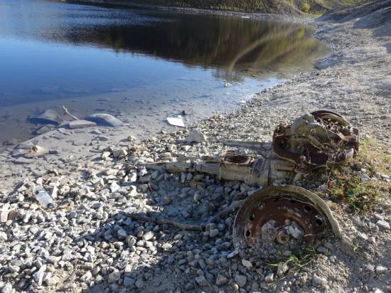 The remains of another well buried vehicle at the lagoon edge
