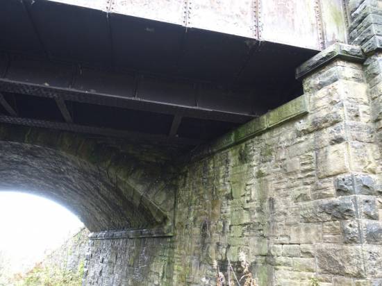 This shows the stone bridge with the cast iron one alongside
