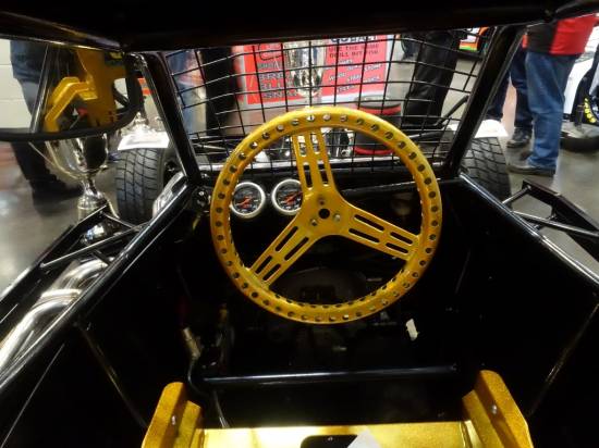 7 - gold steering wheel and seat
