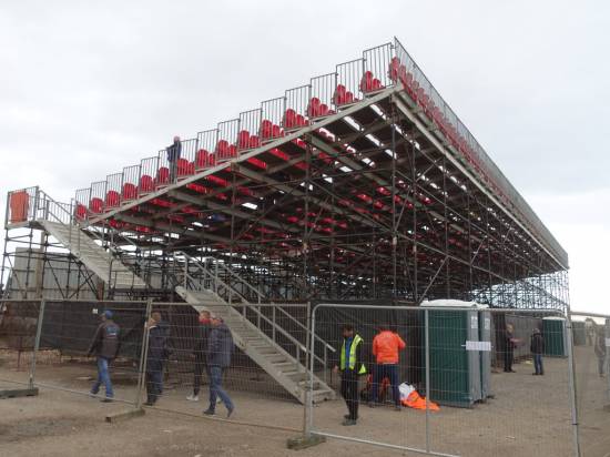 No direct access to the pits from the stand. Through the terraces, up the steps and through the container bridge is the easiest option or walk right around via the back straight.
