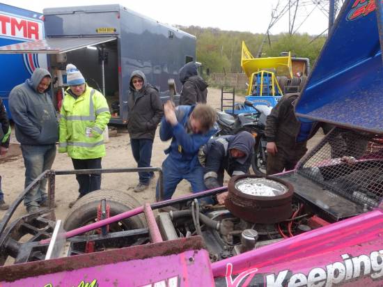 Karl gives the 211 steering arm a good belt much to the amusement of the onlookers
