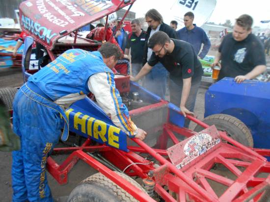 Billy Tom helping out on Mat's car
