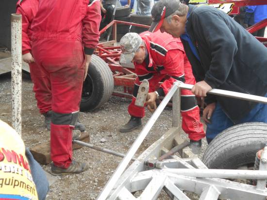Straightening a rod on the 25 car.
